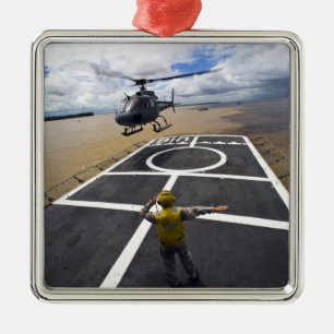 A Brazilian Eurocopter prepares to land Metal Ornament