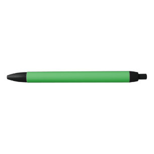 A bright green screen set against a clean white ba black ink pen