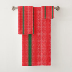 A bright red apple sits on a plain white surface. bath towel set