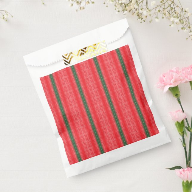 A bright red apple sits on a plain white surface. favour bag (Sealed)