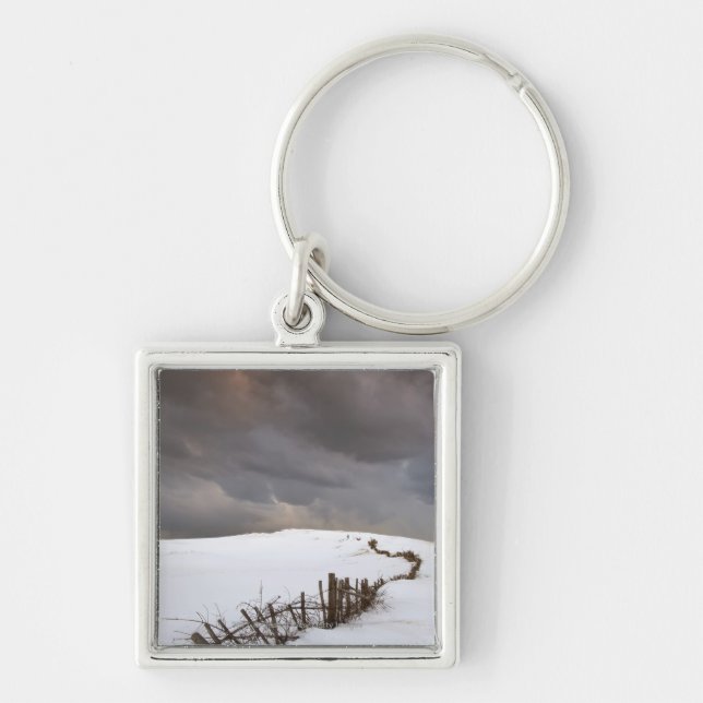 A Broken Fence Along A Snow Covered Field Key Ring (Front)