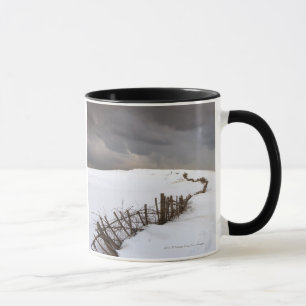 A Broken Fence Along A Snow Covered Field Mug