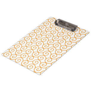A brown and orange rug with a repeating pattern mo clipboard