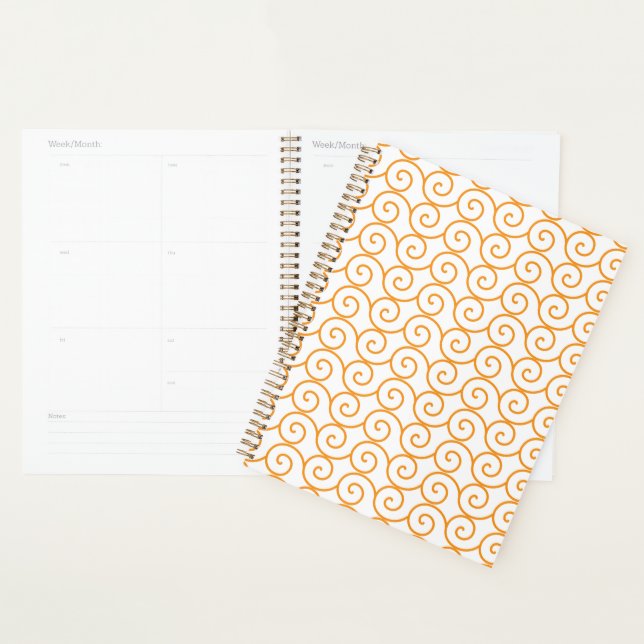 A brown and orange rug with a repeating pattern mo planner (Display)