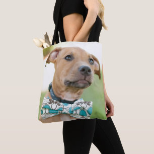 A Brown Puppy Wears A Colourful Bow Tie Tote Bag