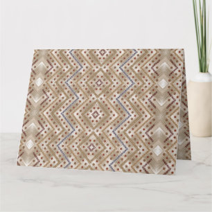 A brown rug displaying a symmetrical design featur card