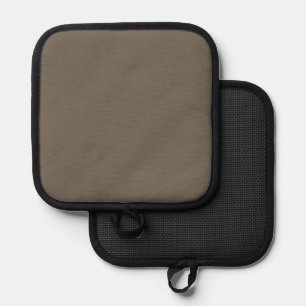 a brown wall with a black and white clock on it pot holder