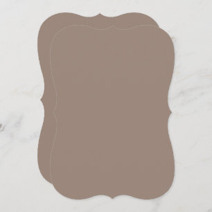 a brown wall with a clock on it