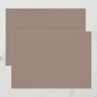 a brown wall with a clock on it