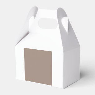 a brown wall with a favour box