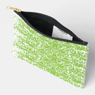 A brown wooden table holds a glass bottle of olive accessory pouch