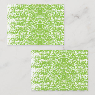 A brown wooden table holds a glass bottle of olive appointment card