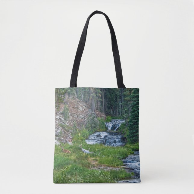 A Buck Rests at a Cascading River Tote Bag (Front)