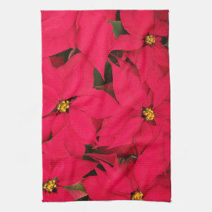 A bunch of Brightly Coloured Christmas Poinsettias Tea Towel