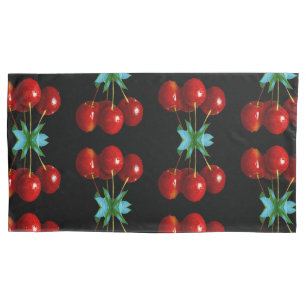 A Bunch Of Red Cherries on Stems Leaves on Black Pillowcase