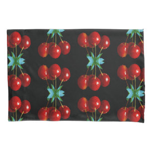 A Bunch Of Red Cherries on Stems Leaves on Black Pillowcase