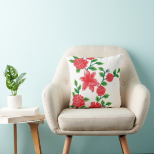 a bunch of red flowers on a white background cushion