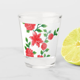 a bunch of red flowers on a white background shot glass