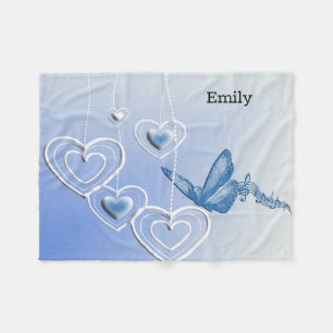 A butterfly and hearts fleece blanket