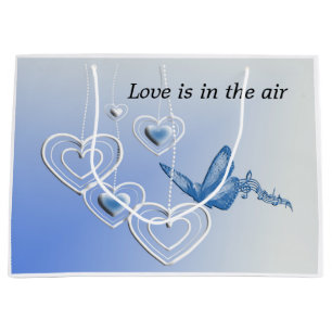 A butterfly and hearts large gift bag