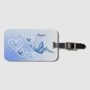 A butterfly and hearts luggage tag