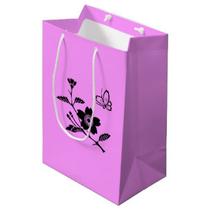 A butterfly in the middle of a cherry tree medium gift bag