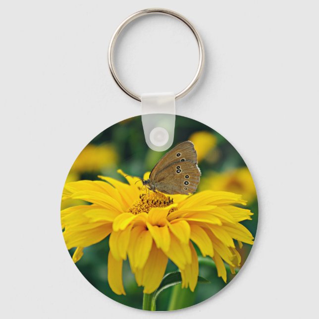 A butterfly on a yellow flower keychain (Front)