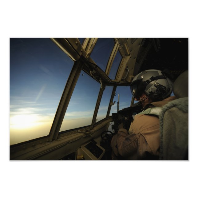 A C-130 Hercules pilot scans the horizon Photo Print (Front)