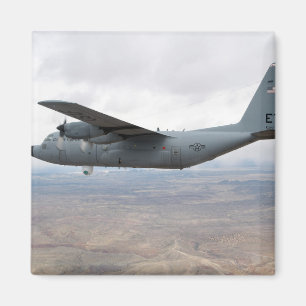 A C-130 Hercules soars through the sky Magnet