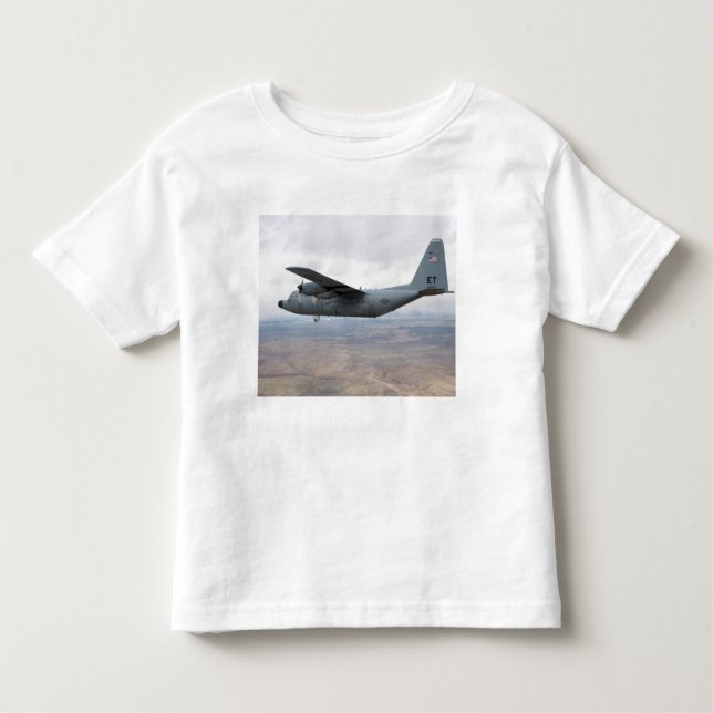 A C-130 Hercules soars through the sky Toddler T-Shirt (Front)
