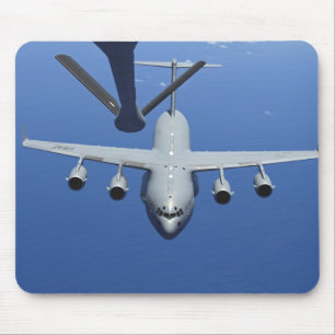 A C-17 Globemaster III approaches the boom Mouse Pad