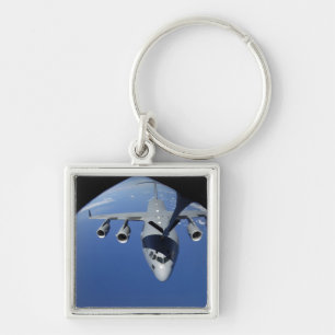 A C-17 Globemaster III receives fuel 2 Key Ring