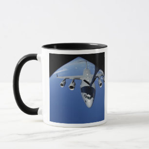 A C-17 Globemaster III receives fuel 2 Mug