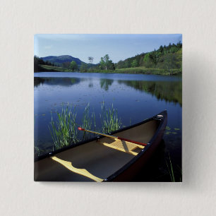 A canoe rests on the shore of Little Long Pond 15 Cm Square Badge