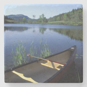 A canoe rests on the shore of Little Long Pond Stone Coaster