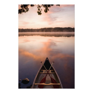 A canoe rests on the shore of Pawtuckaway Lake Photo Print