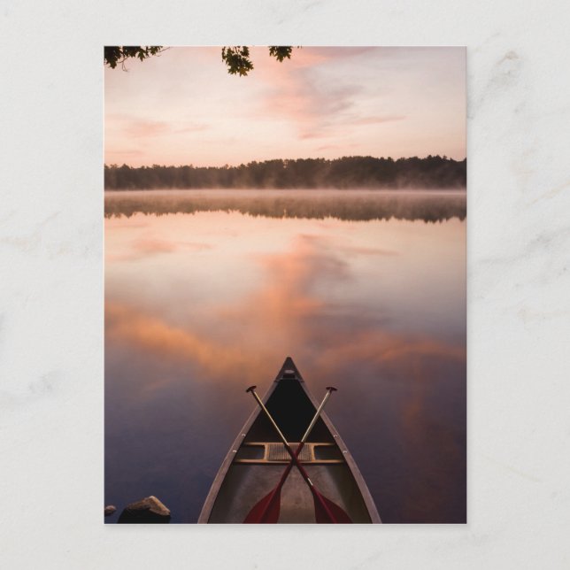 A canoe rests on the shore of Pawtuckaway Lake Postcard (Front)