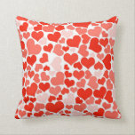 A Cascade of Love -  Hearts Pattern Cushion<br><div class="desc">A pattern consisting of many different sized hearts ranging from soft seashell pink to bright fire engine red. A colourful valentines themed design. Express your love with a cute heart themed gift.</div>