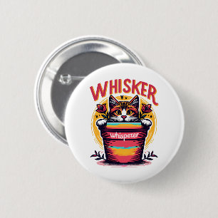 A cat peeking out from behind a flowerpot 6 cm round badge