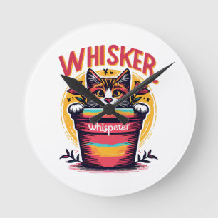 A cat peeking out from behind a flowerpot round clock