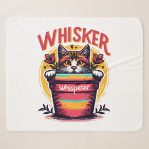 A cat peeking out from behind a flowerpot sherpa blanket