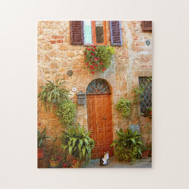 A cat seeks entrance to home in Pienza, Italy Jigsaw Puzzle (Vertical)