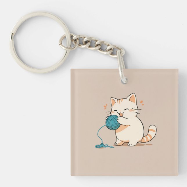 A cat spinning yarn is so cute key ring (Front)