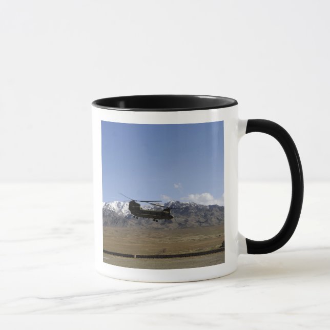 A CH-47 Chinook takes off Mug (Right)