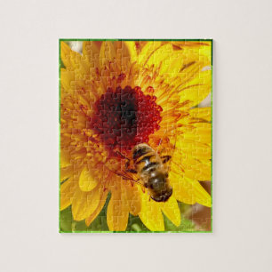 A cheerful flower with a busy bee puzzle.  jigsaw puzzle