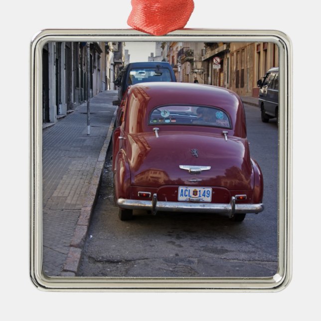 A classic old red Peugeot car parked on a street Metal Ornament (Front)