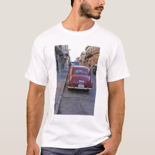 A classic old red Peugeot car parked on a street T-Shirt