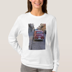 A classic old red Peugeot car parked on a street T-Shirt
