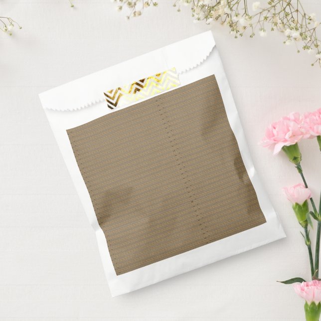 A close-up image showcasing a fabric with a tan an favour bag (Sealed)
