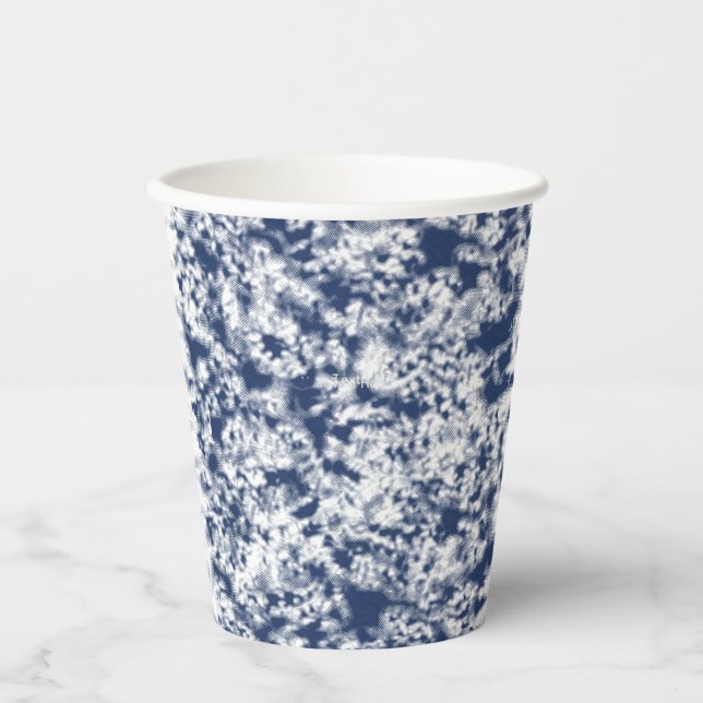 A close-up of a hydrangea showcases its delicate p paper cups (Front)